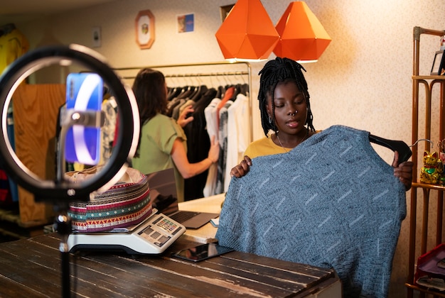 Woman promoting cloths from thrift store