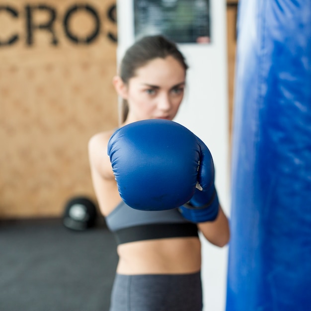 Woman punching to camera