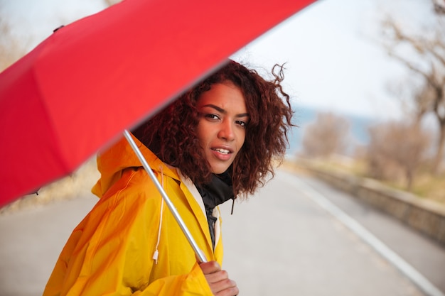 Free photo woman in raincoat