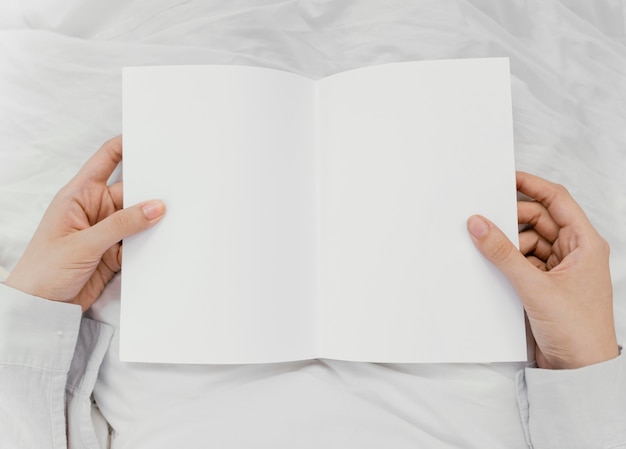 Woman reading a book alone