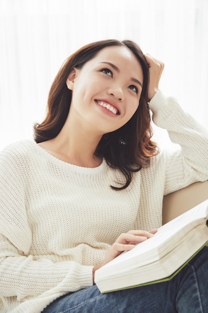 Free photo woman reading fantastic book