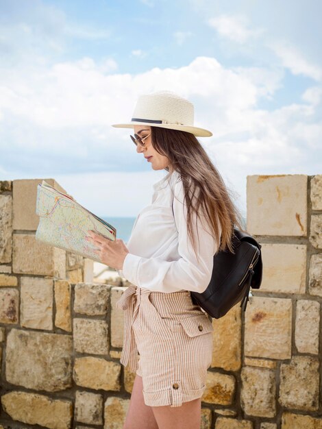 Woman reading map