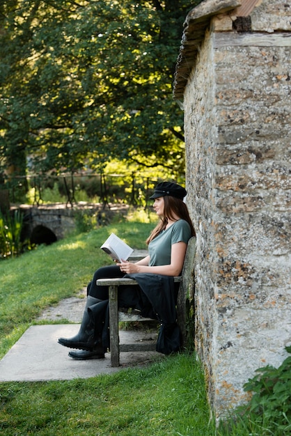 Woman reading while traveling alone