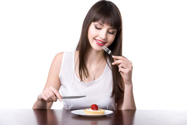 Woman ready to eat a cake