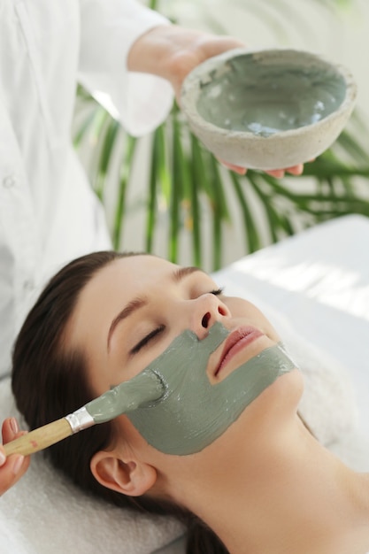 Woman receiving a beauty treatment for skin care