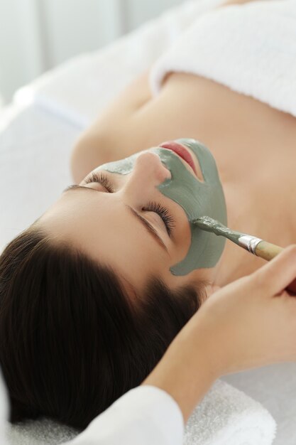 Woman receiving a beauty treatment for skin care