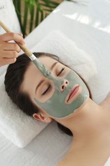 Woman receiving a beauty treatment for skin care