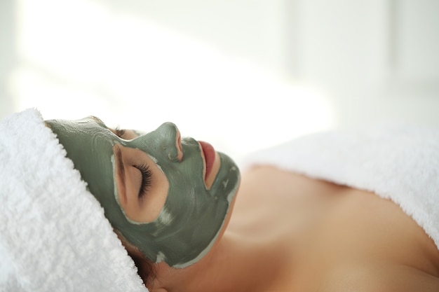 Woman receiving a beauty treatment for skin care