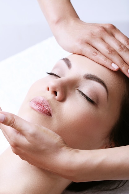 Woman receiving massage on a spa center