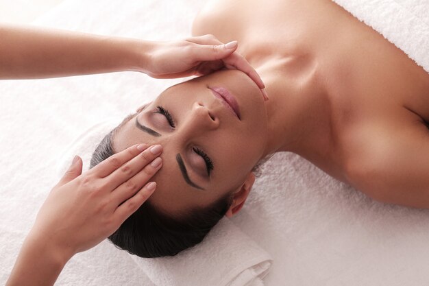 Woman receiving a relaxing massage at the spa