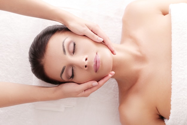 Woman receiving a relaxing massage at the spa