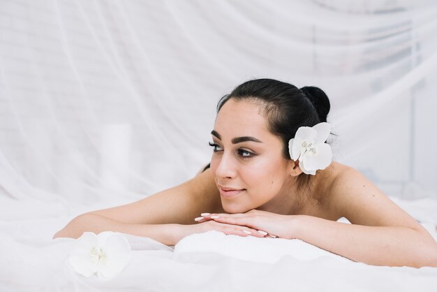 Woman receiving a relaxing massage in a spa