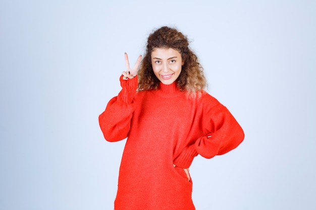 woman in red sweatshirt giving cheerful and positive poses. 