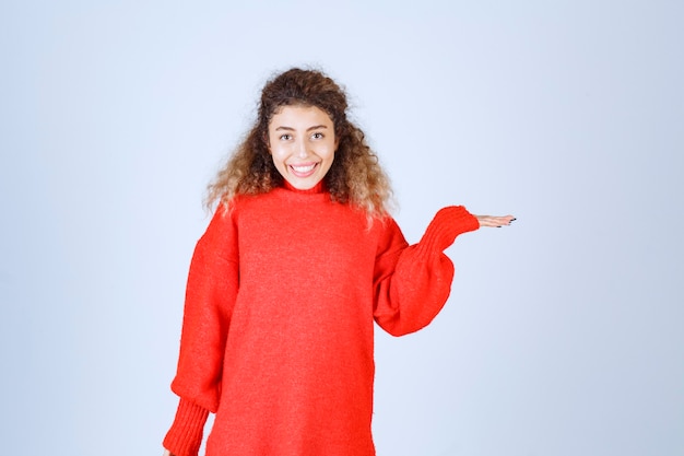 woman in red sweatshirt giving cheerful and positive poses. 