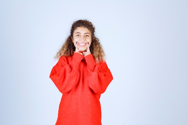 woman in red sweatshirt giving cheerful and positive poses. 