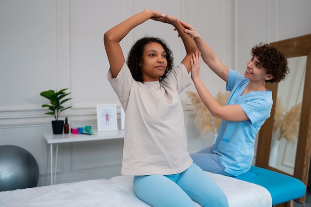 Free photo woman in a rehabilitation center getting treatment