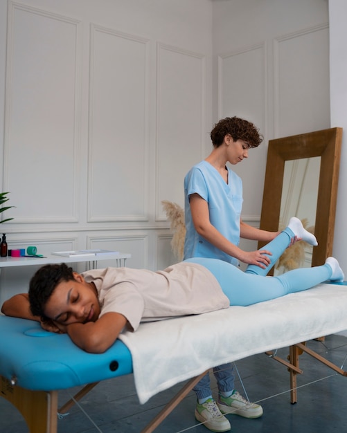 Free photo woman in a rehabilitation center getting treatment