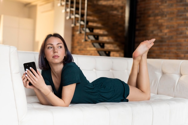 Free photo woman relaxing alone at home