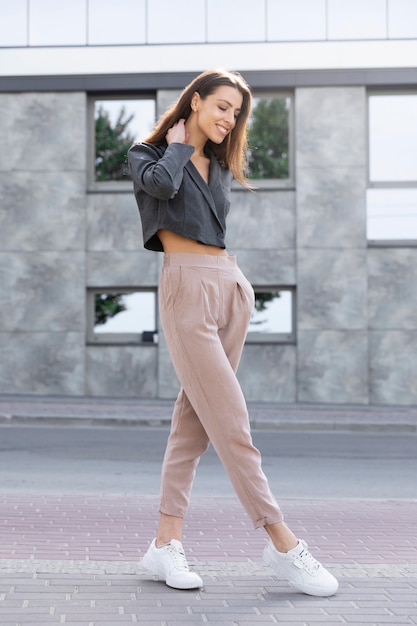 Free photo woman relaxing in a clean urban space