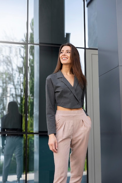 Free photo woman relaxing in a clean urban space