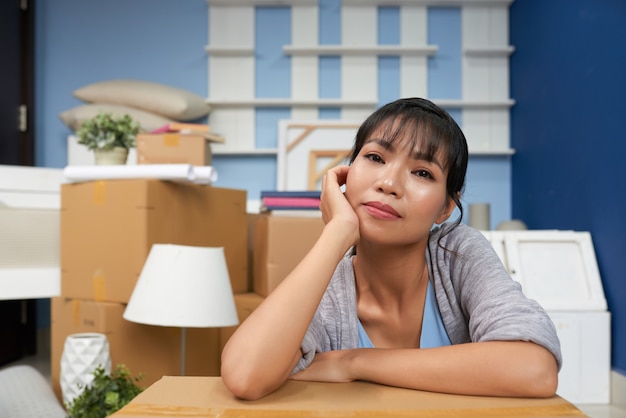 Free photo woman relaxing in new home