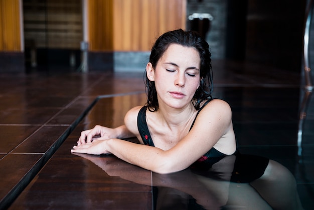 Woman relaxing in spa