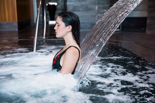 Woman relaxing in spa