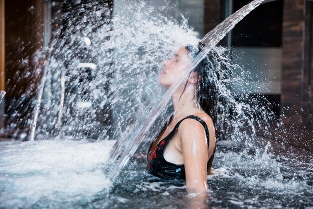 Woman relaxing in spa