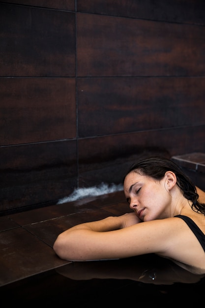 Woman relaxing in spa