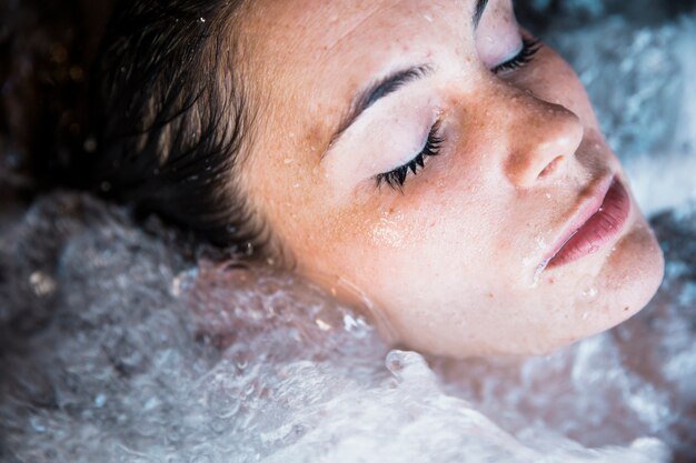 Woman relaxing in whirlpool