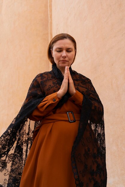 Woman during religious pilgrimage at the church