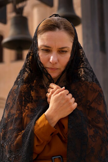 Woman during religious pilgrimage at the church