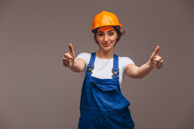 Woman repairer with painting roller isolated