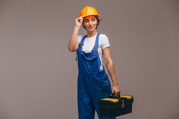 Foto gratuita riparatore della donna con il rullo di pittura isolato