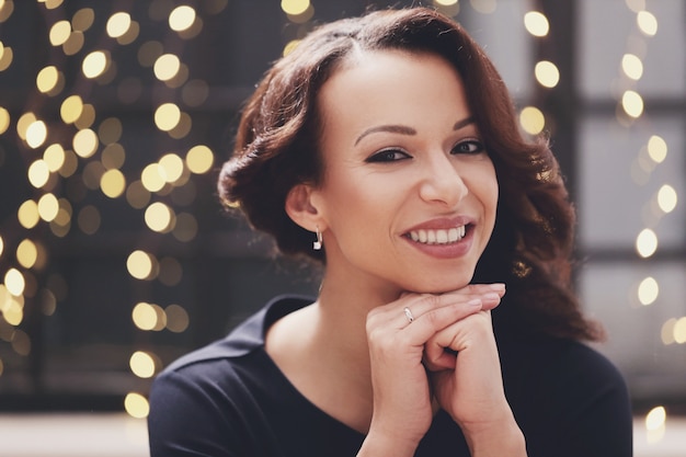 Woman in restaurant posing