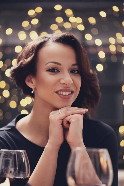 Woman in restaurant posing