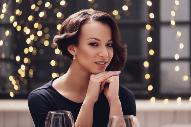 Woman in restaurant posing