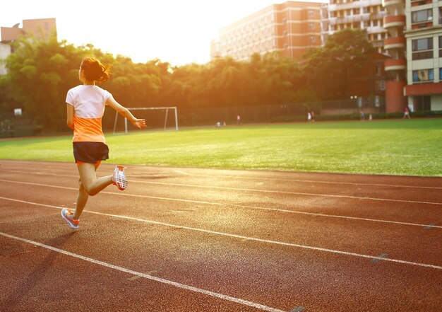 Woman running in a sports circuit