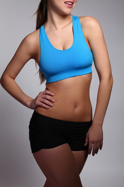 Woman's body in a fitness wear