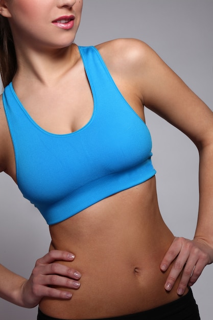 Free photo woman's body in a fitness wear