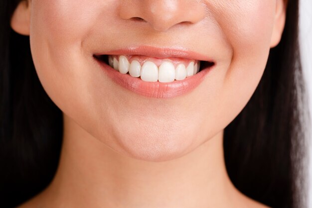 Woman's smile with clear skin