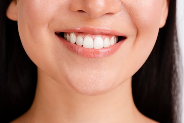 Woman's smile with clear skin