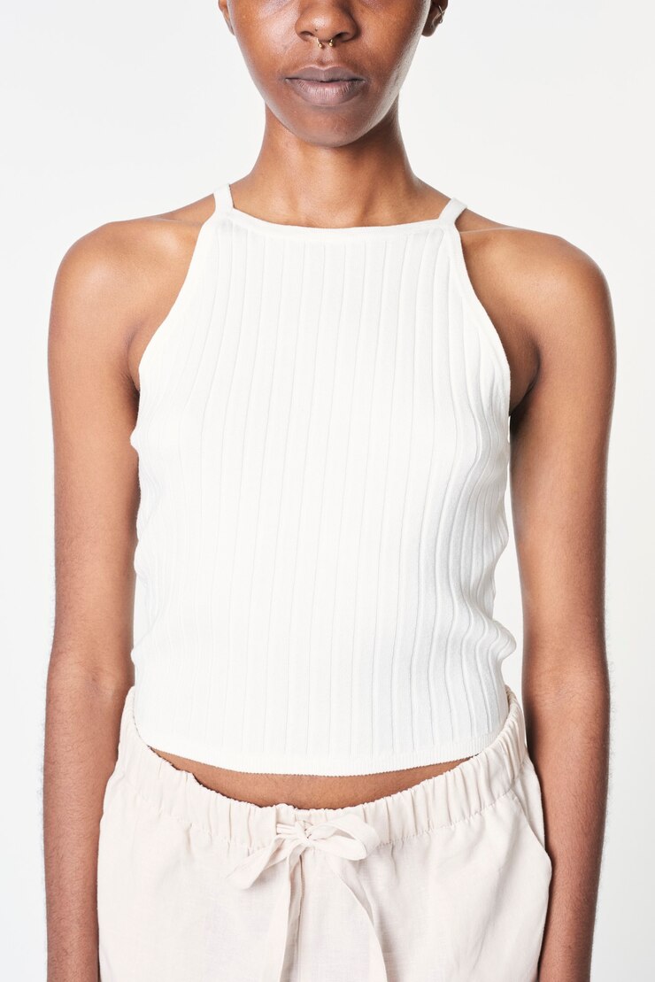 Free Photo woman's white crop top with sweatpants