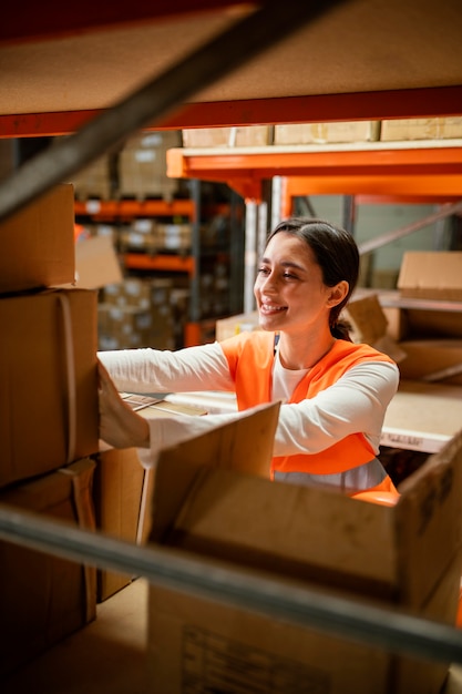 Woman in safety equipment working