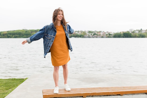 Free photo woman on sea benches