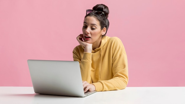 Woman searching the internet for plane tickets