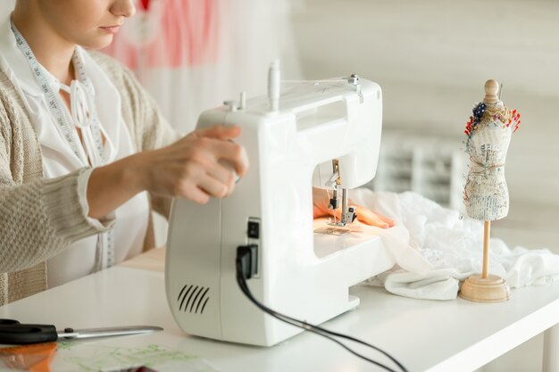 Woman at a sewing machine