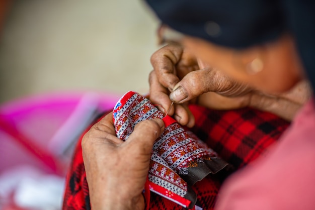 Free photo woman sewing