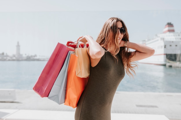 Woman shopping near the sea