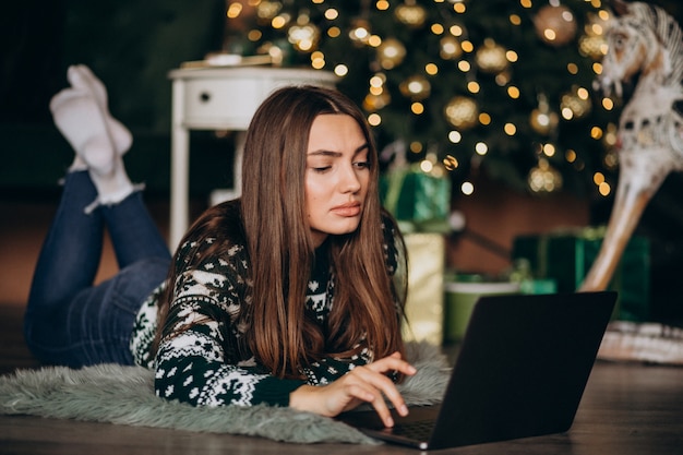 Woman shopping online on Christmas sales